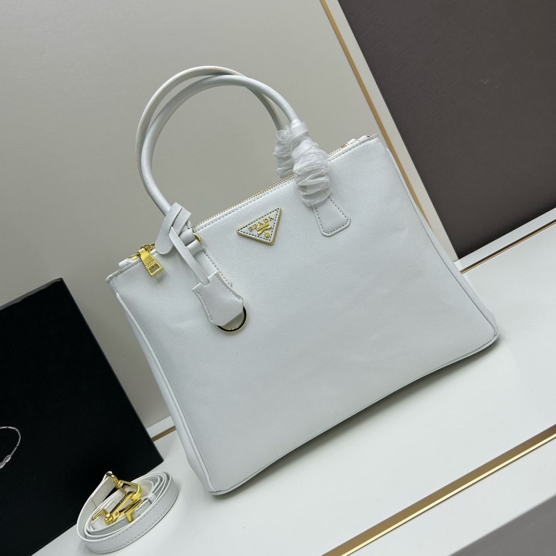 Pra*a top handle bags